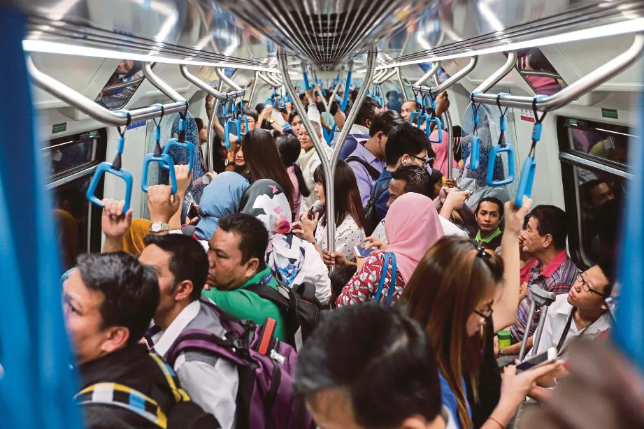 crowded train coach as an analogy about an app scaling to handle more users and usage